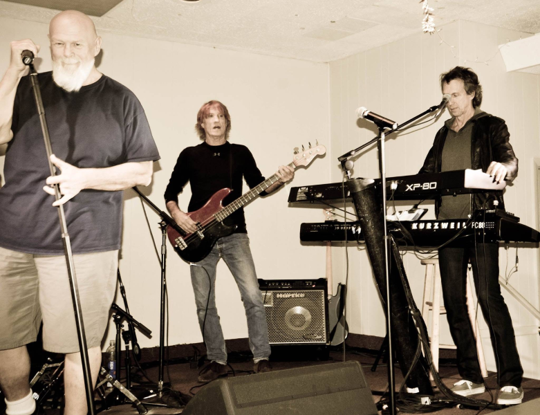 Roadmaster members Asher Benrubi on vocals, Toby Myers on bass guitar and Michael Read on keyboards at the Riviera Club, circa 2016.