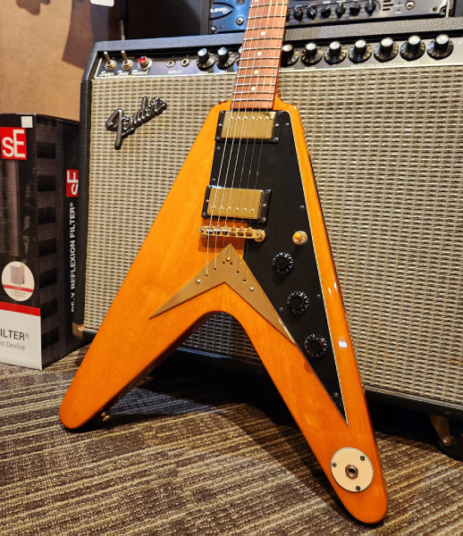 The Epiphone Limited Edition Joe Bonamassa “Amos” 1958 Flying V, a tribute to the original Gibson guitar sold through Arthur’s Music Store and later acquired by Bonamassa.