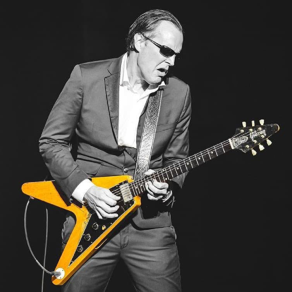 Joe Bonamassa performs with “Amos,” the 1958 Gibson Flying V originally sold through Arthur’s Music Store in Indianapolis. Photo by Steve Rose.
