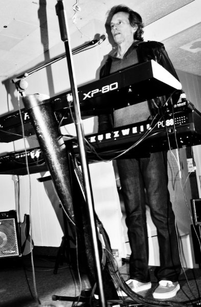 Michael Read performs on keyboards at the Riviera Club, circa 2016.