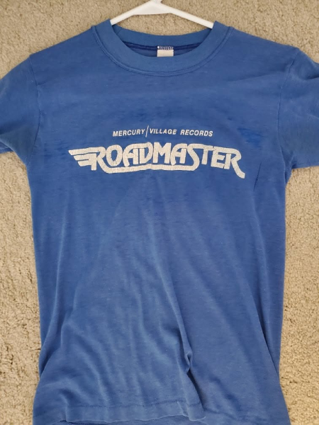 The front of a vintage Roadmaster *Hey World* T-shirt features the band’s winged logo and Mercury/Village Records. Photo courtesy of Brad Farber.