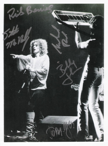 An autographed performance photo of Roadmaster’s Steve “Mac” McNally, left, and Michael Read. Photo courtesy of Jim Drew.