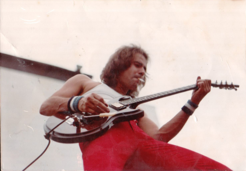 Roadmaster guitarist Ricky Benick performs at the North Drive-In in Alexandria, Indiana, in 1981. Photo by Michael Brooks.