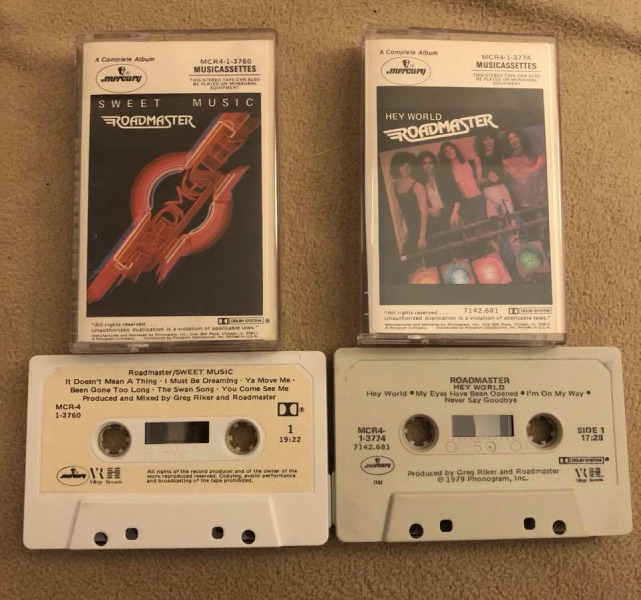 Cassette editions of Roadmaster’s “Sweet Music” and “Hey World” albums, shown with their original cases. Photo courtesy of Bob Drew.
