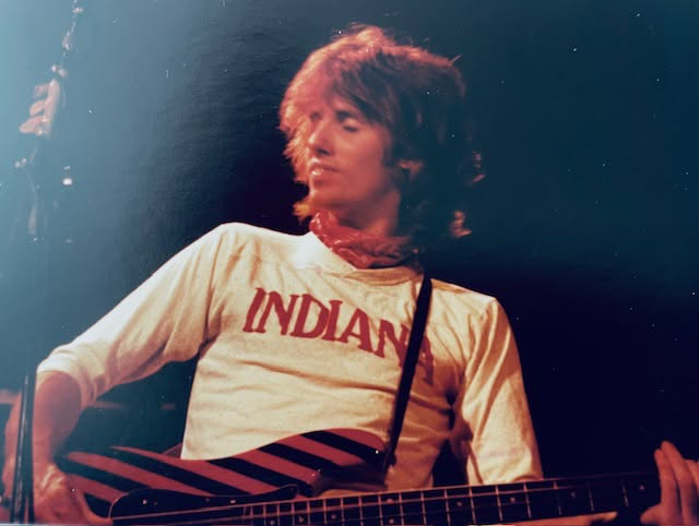 Roadmaster bassist Toby Myers performing with his red-and-black striped bass. Photo courtesy of Bobby Johns.