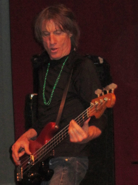 Toby Myers performing on bass guitar. Photo courtesy of Randall Halcomb.